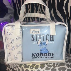 Disney 3 piece Stitch makeup bag-cosmetic bag set.
Says “nobody gets left behind
